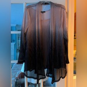 2 piece formal top from David’s Bridal. Size 22W Pants 20W included.Not original